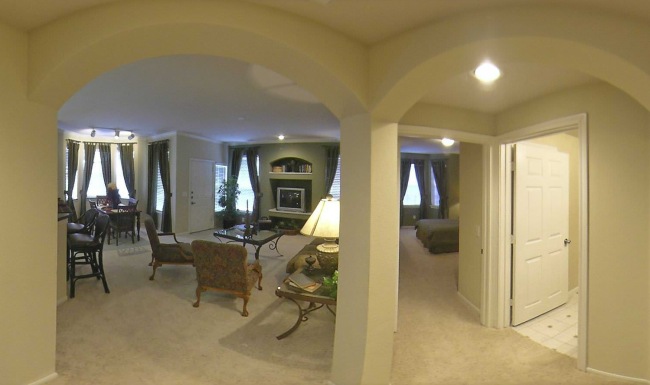 a room with a table and chairs