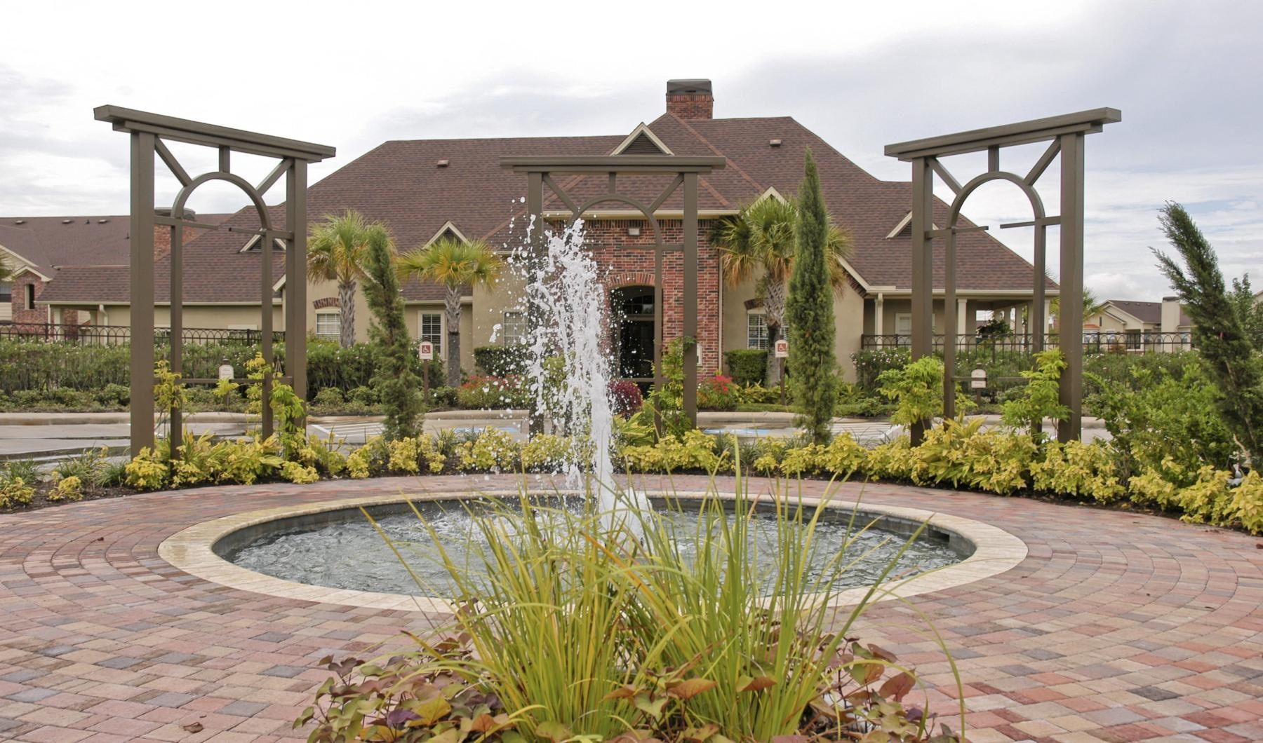 a fountain in a courtyard