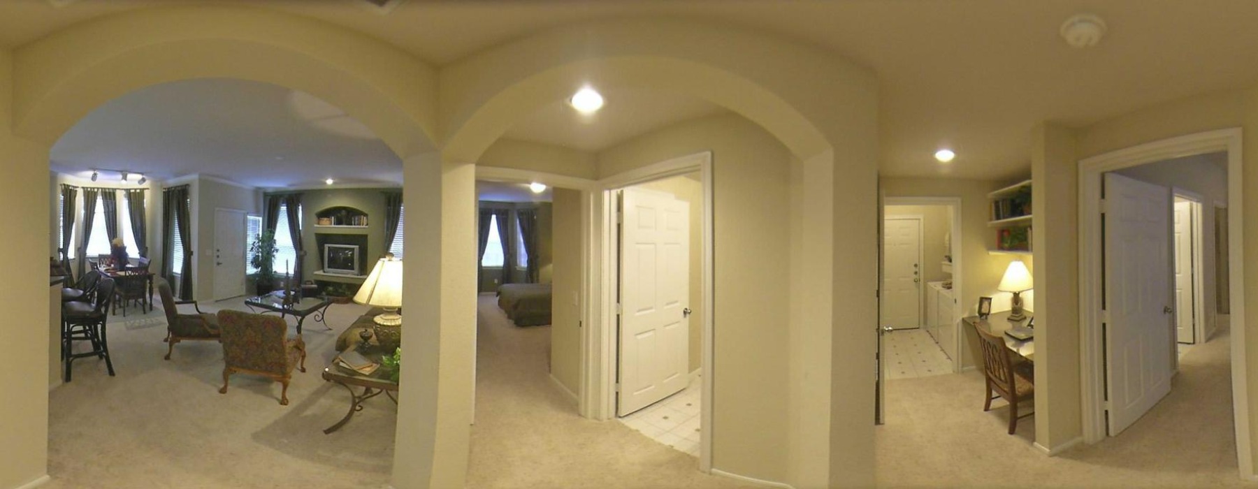 a room with a table and chairs