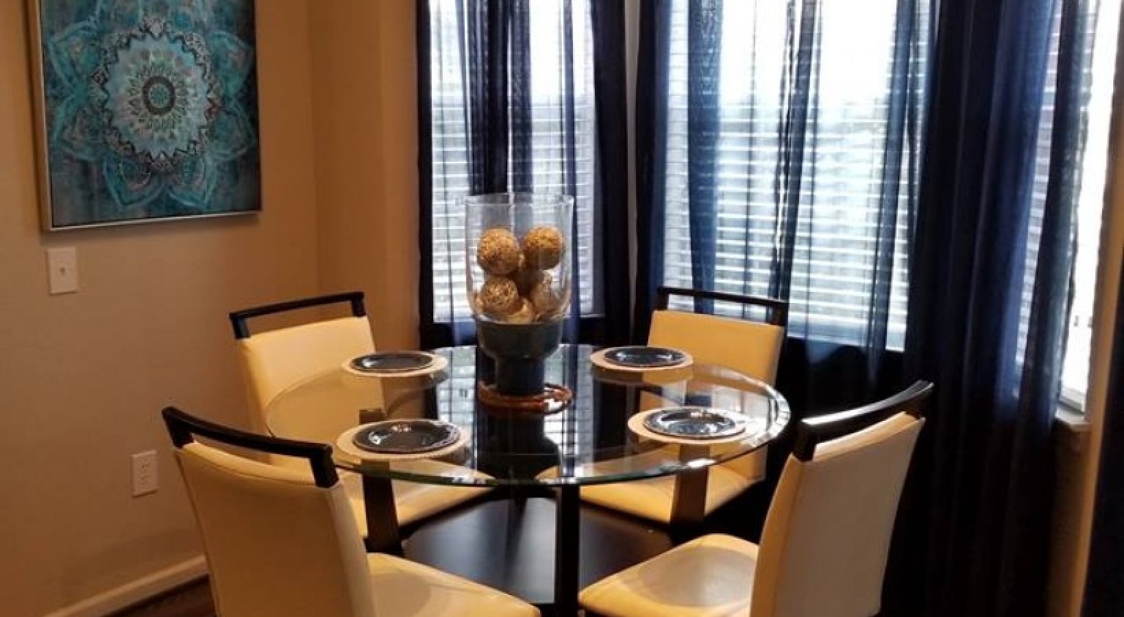 a dining table with chairs 